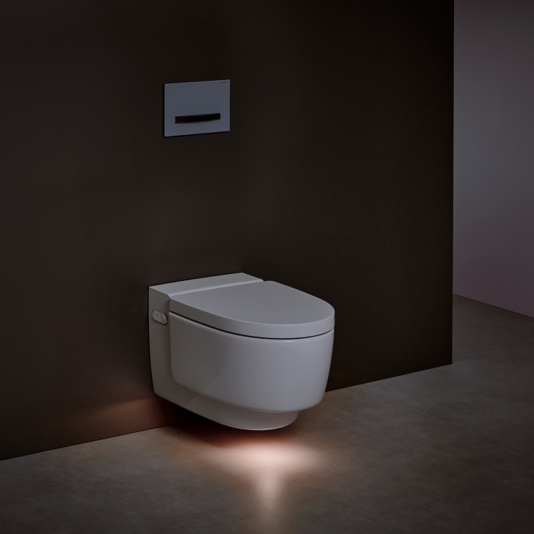Унитаз-биде Geberit AquaClean Mera с включенной подсветкой Унитаз-биде Geberit AquaClean Mera с включенной подсветкой
