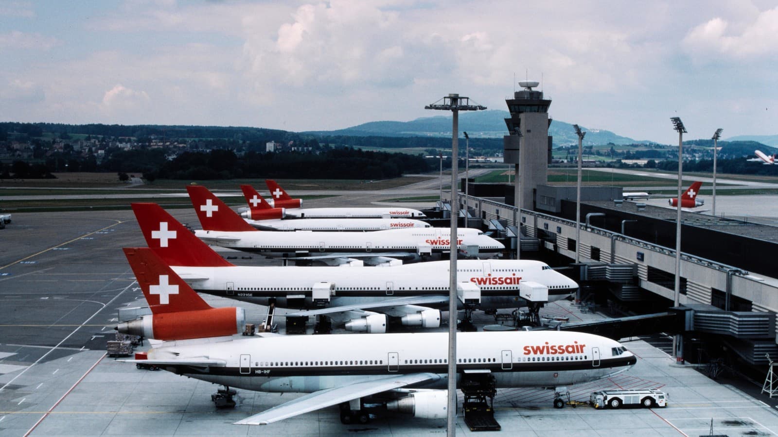 Aircraft of the former Swissair are parked at the dock of Terminal A in Zurich in the 1980s (© ETH-Bibliothek Zürich) Aircraft of the former Swissair are parked at the dock of Terminal A in Zurich in the 1980s (© ETH-Bibliothek Zürich)
